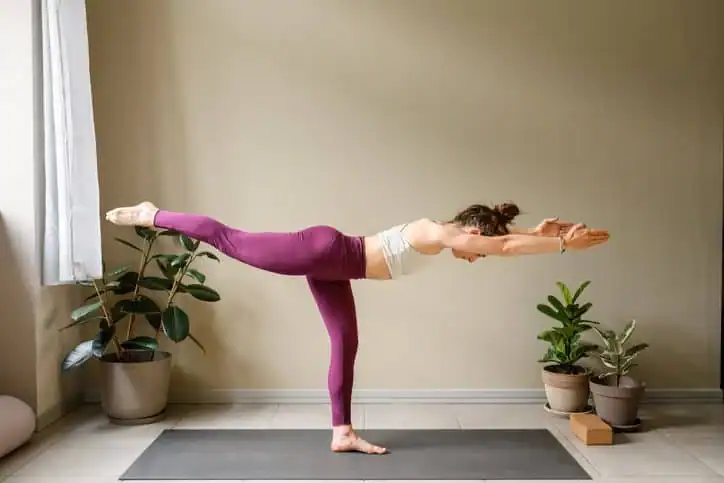 Woman doing Yoga exercise Halesowen to help with toning the body. 