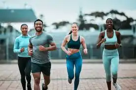 image of man and 3 women doing cardio exercise Halesowen to help tone and remove fat from the body.