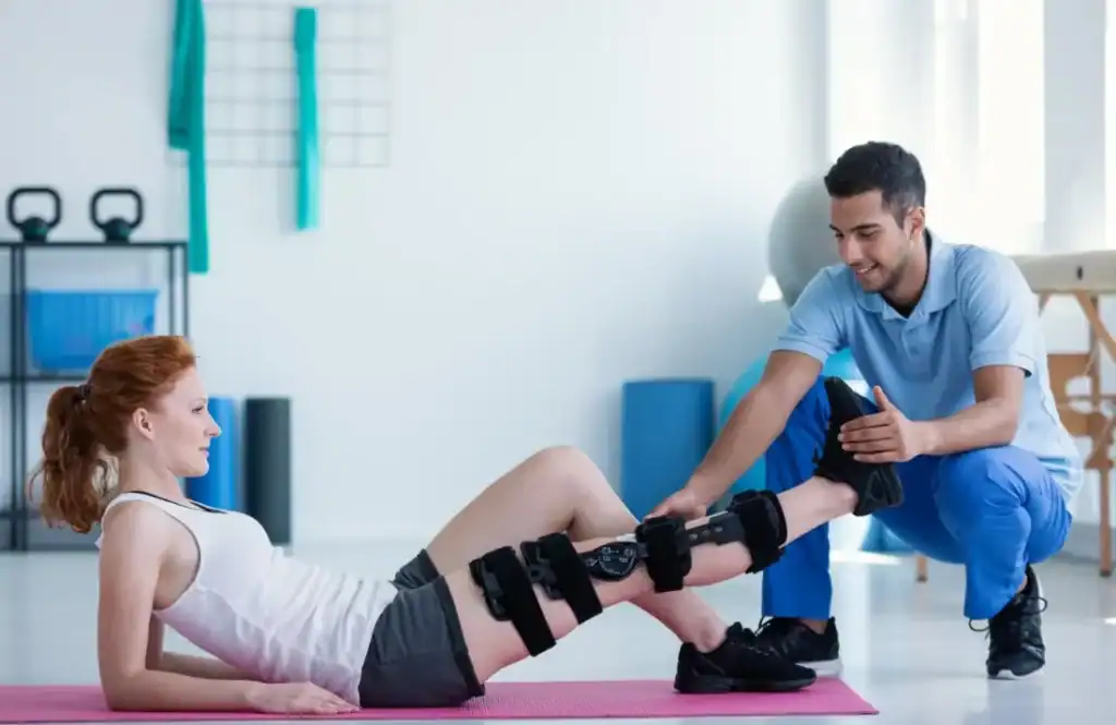Woman having treatment to help muscle recovery Halesowen after an injury
